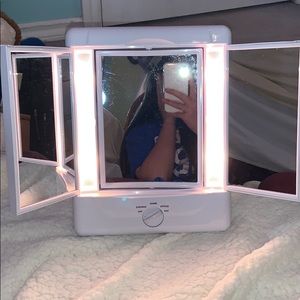 Makeup mirror with built in lights